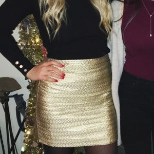 Gold skirt.